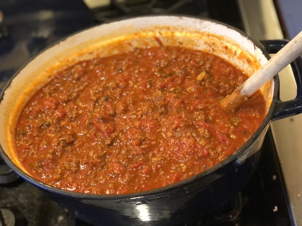 Super Meaty Spaghetti Sauce from Farmwife Feeds uses jarred sauce, mushrooms, hamburger and sausage for a sauce that tastes completely homemade.