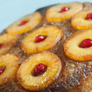 Pineapple Upside Down Cake from Farmwife Feeds is traditional cast iron skillet recipe from my Mom. #castiron #pineapple #recipe