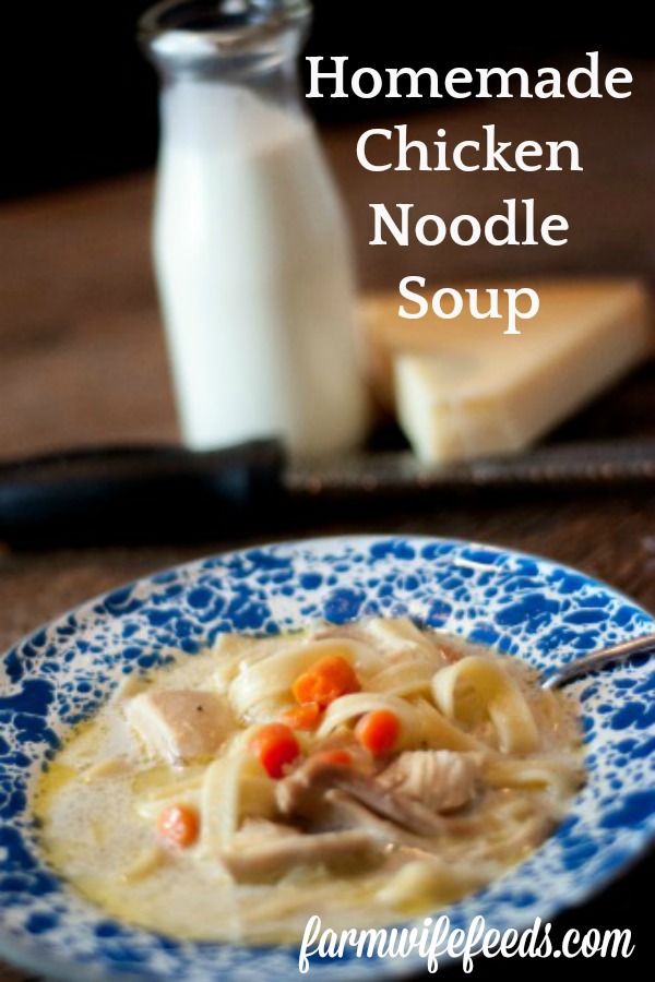 Homemade Chicken Noodle Soup from Farmwife Feeds is full of chicken, noodles, vegetables with heavy cream and parmesan cheese. #recipe #soup #chicken