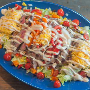 This Southwest Steak Fajita Salad made with a flank steak is super easy to throw together while the steak is on the grill and is super delicious!