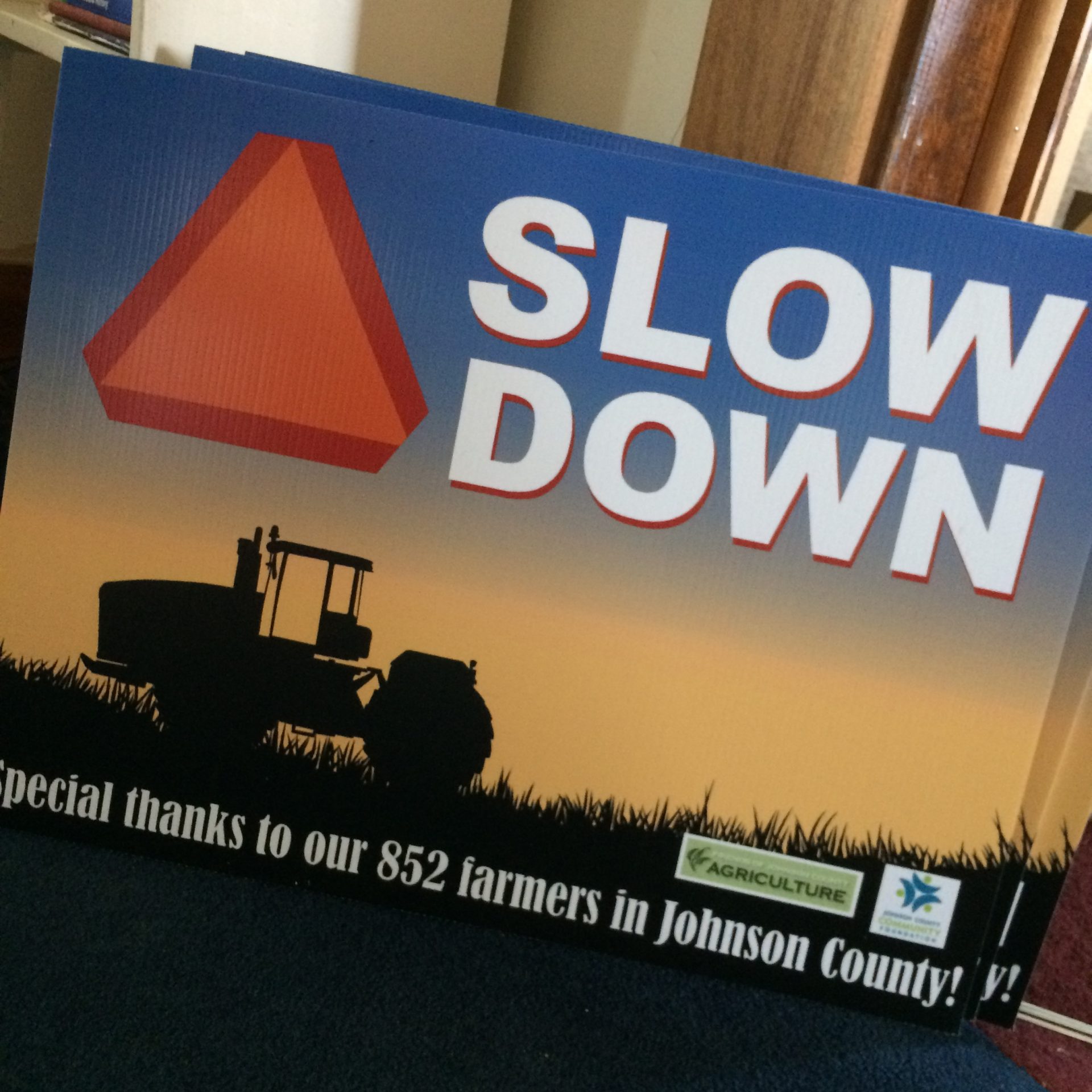 What do I do when I see a tractor on the road?