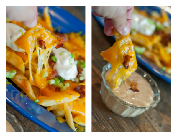 These Loaded Steak Fries are the ultimate side for meat off the grill. With cheese and bacon you can't go wrong, did I mention the amazing spicy Ranch dripping sauce?