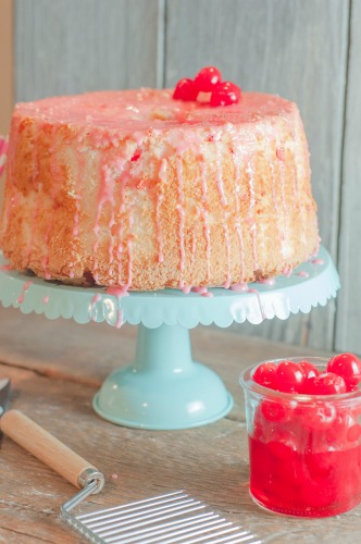 This cake, this Maraschino Cherry Angel Food Cake is so fluffy and sweet and cherry flavored and so super easy you might make it twice in 3 days just because it's that good and that easy!