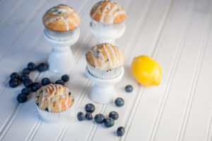 Easy Lemon and Blueberry Muffin Recipe using a box mix with a tart lemon glaze!