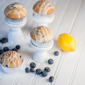 Easy Lemon and Blueberry Muffin Recipe using a box mix with a tart lemon glaze!
