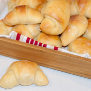 Homemade Crescent Rolls, glazed yeast rolls for family dinners from Farmwife Feeds #yeastrolls #recipes #homemade