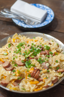 Cheesy Smoked Sausage Bowties-pasta, cheese, bell peppers, smoked sausage - a one skillet meal to feed the family!