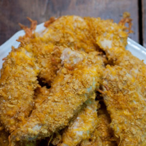 These Cheesy Chicken Tenders are a go to comfort food here! Moist with a cheesy crunchy cornflake coating!