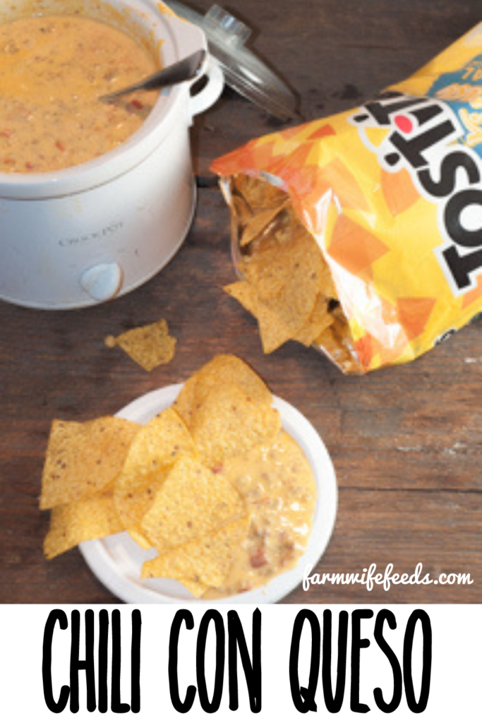 Chili Con Queso from Farmwife Feeds is an easy 3 ingredient dip appetizer snack that is a crock pot classic. #crockpot #dip #mexican