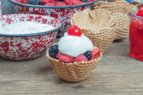 Marshmallow Dip Fruit Cup Sundaes from Farmwife Feeds made with marshmallow cream, cream cheese and fresh fruit in waffle cone bowls #sundae #sundaes #fruit #recipe