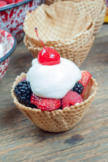Marshmallow Dip Fruit Cup Sundaes from Farmwife Feeds made with marshmallow cream, cream cheese and fresh fruit in waffle cone bowls #sundae #sundaes #fruit #recipe