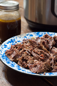 Close up of tender shredded beef roast cooked in the Instant Pot until fall apart tender