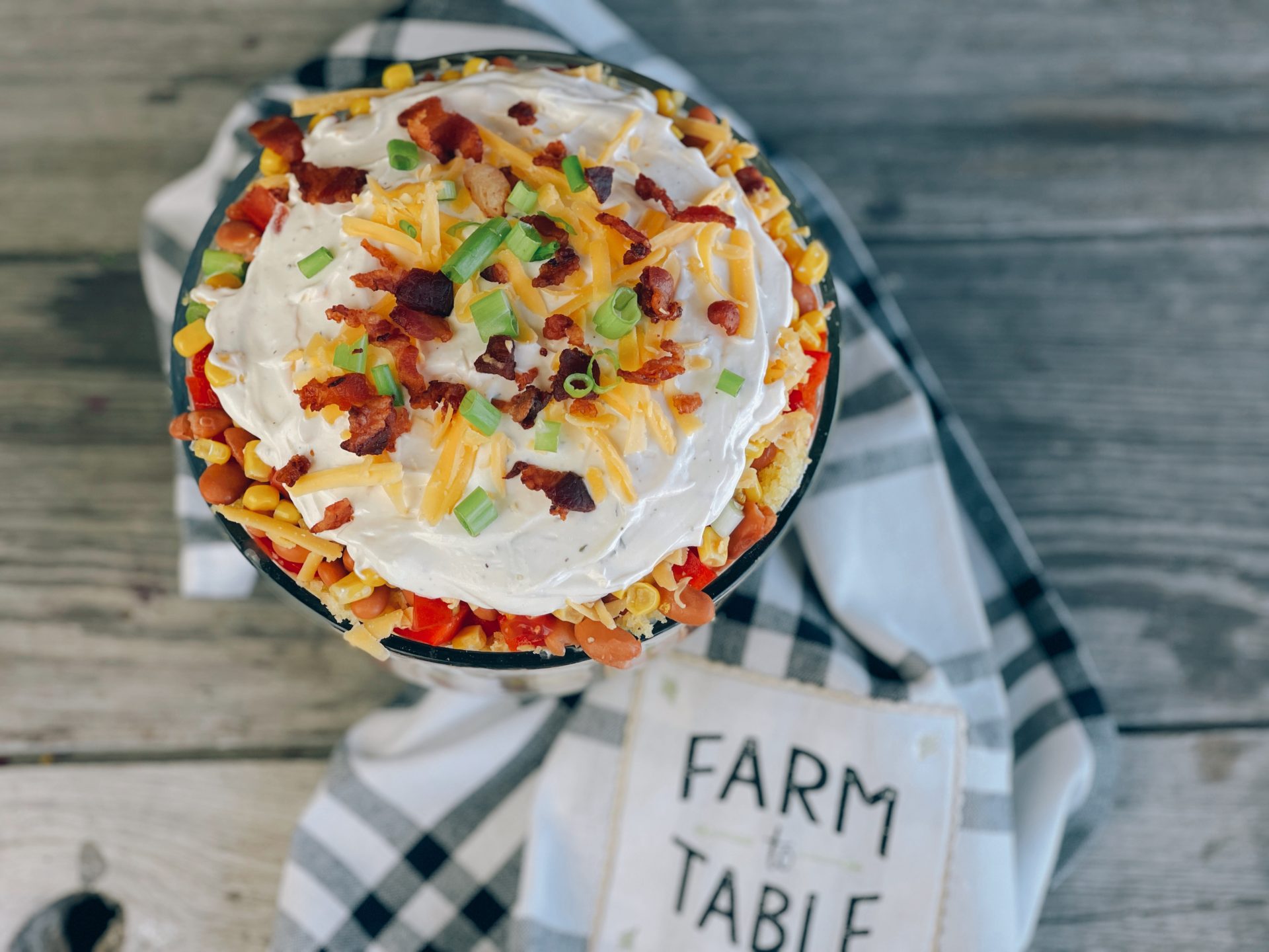 Back Home Cornbread Salad from Farmwife Feeds, an easy layered salad perfect for get-togethers or pitch-ins. #salad #layeredsalad #cornbread