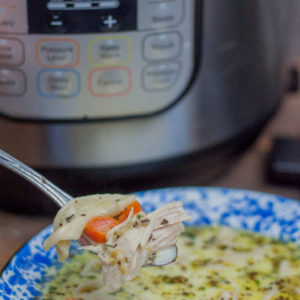 Instant Pot Homemade Chicken Noodle Soup from Farmwife Feeds is a one pot wonder that will warm you from the inside out! #chicken #soup #instantpot #homemade