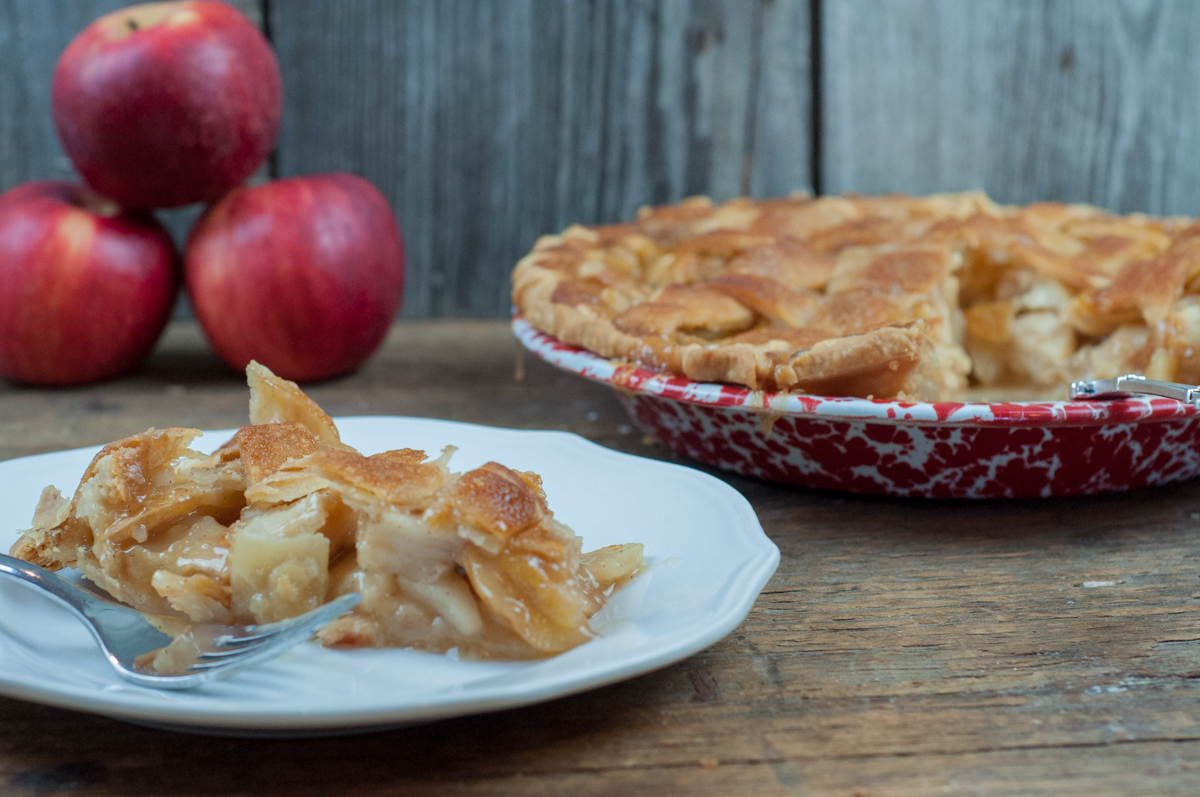 Pour Over Apple Pie is a super easy to make pie that has a sweet caramel sauce poured over the entire pie and then baked from Farmwife Feeds #apple #applepie #recipe #pie #homemade