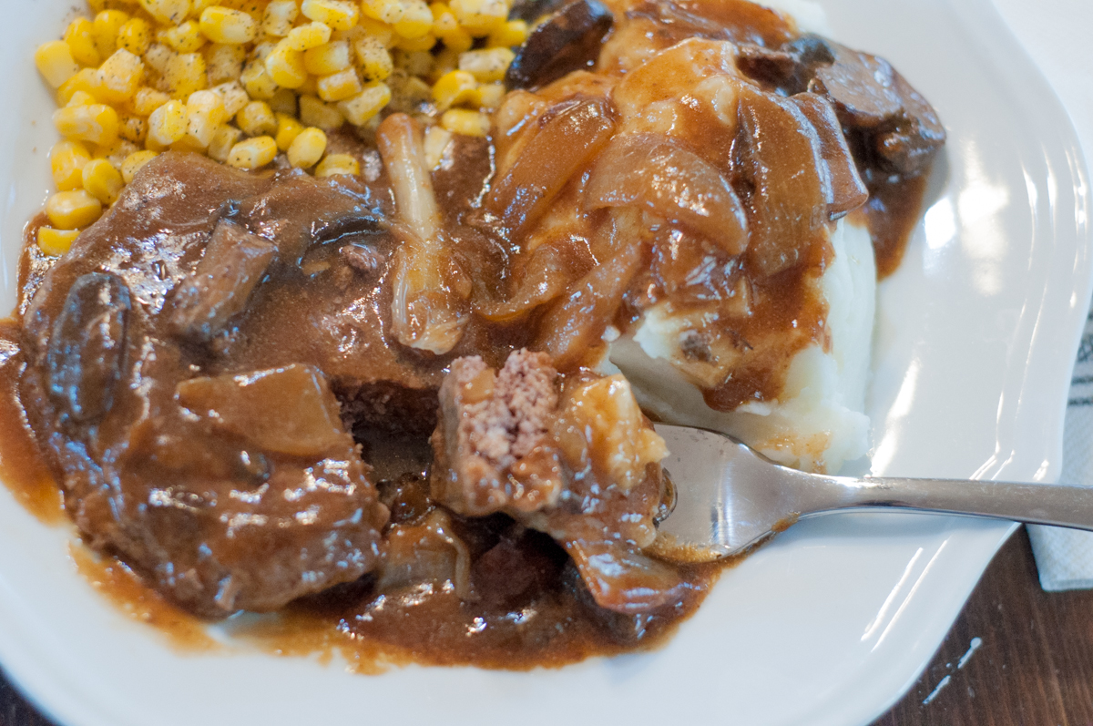 Easy Cast Iron Skillet Hamburger Steaks from Farmwife Feeds, comfort food that's family friendly. #recipes #castiron #beef #comfortfood