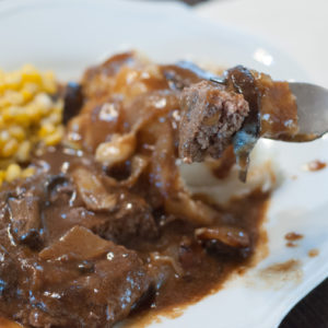 Easy Cast Iron Skillet Hamburger Steaks from Farmwife Feeds, comfort food that's family friendly. #recipes #castiron #beef #comfortfood