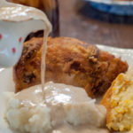 Fried Chicken and Skillet Gravy from Farmwife Feeds is just like Grandma's Sunday Dinner #recipe #castiron #chicken #friedchicken
