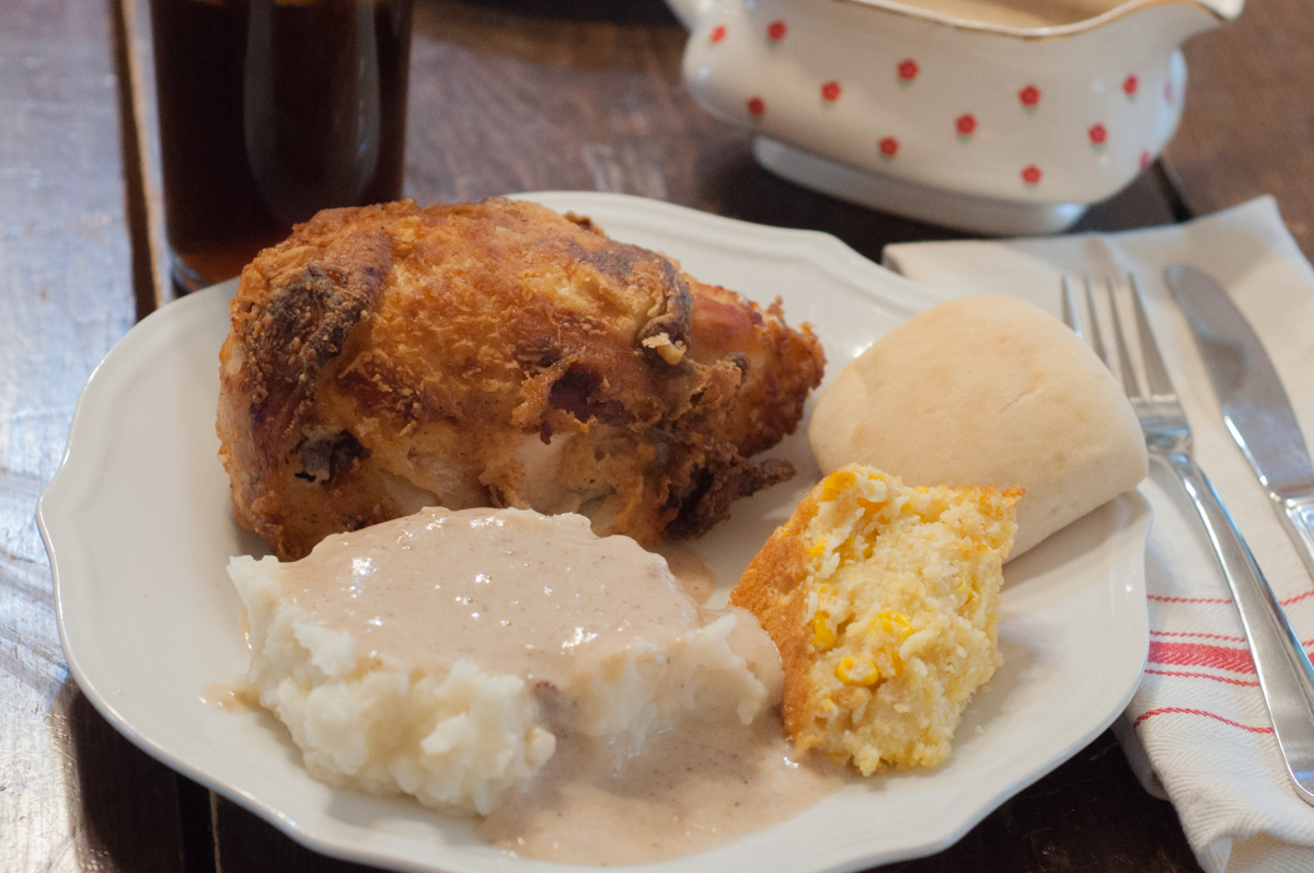 Fried Chicken and Skillet Gravy from Farmwife Feeds is just like Grandma's Sunday Dinner #recipe #castiron #chicken #friedchicken