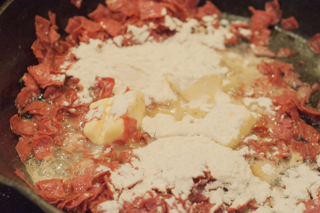 butter and flour added to dried beef to make roux for creamed chipped beef gravy