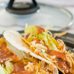 Crock Pot Chicken Tacos from Farmwife Feeds is super easy meal when you forgot to plan or as part of the plan! #chicken #crockpot #mexican
