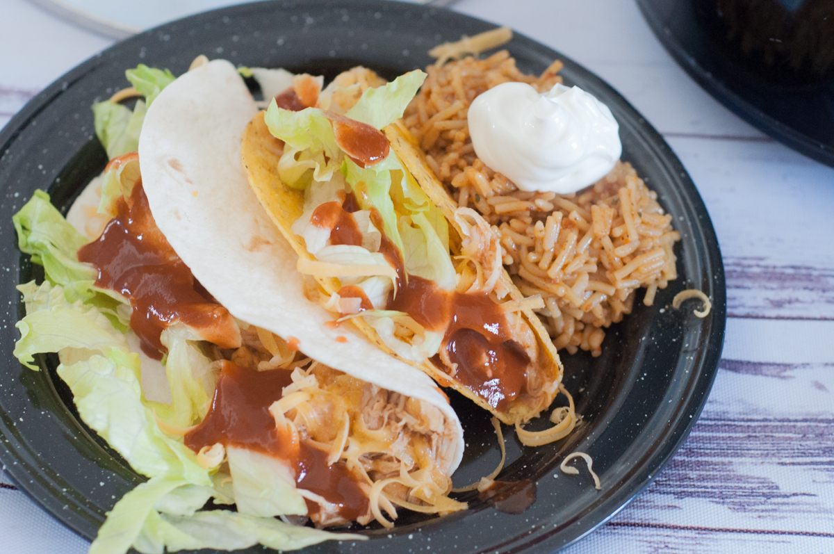 Crock Pot Chicken Tacos from Farmwife Feeds is super easy meal when you forgot to plan or as part of the plan! #chicken #crockpot #mexican