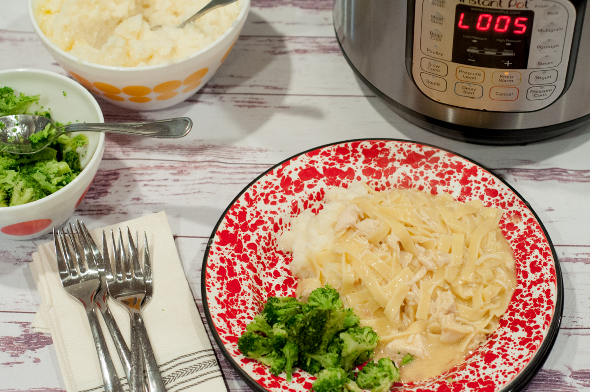 Instant Pot Chicken and Noodles from Farmwife Feeds, all the flavor of cooked all day richness in a lot less time. #chicken #recipe #instantpot #comfortfood