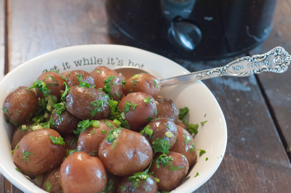 Crock Pot Buttered Parsley Potatoes are a super simple side dish recipe from Farmwife Feeds. #recipe #sidedish #crockpot #potatoes