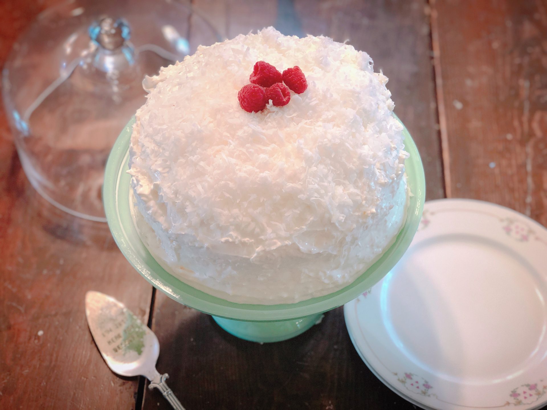 Coconut Icebox Cake from Farmwife Feeds -a traditional refrigerator cake and a poke cake all together that is better when you make it a day ahead. #coconut #cake #pokecake