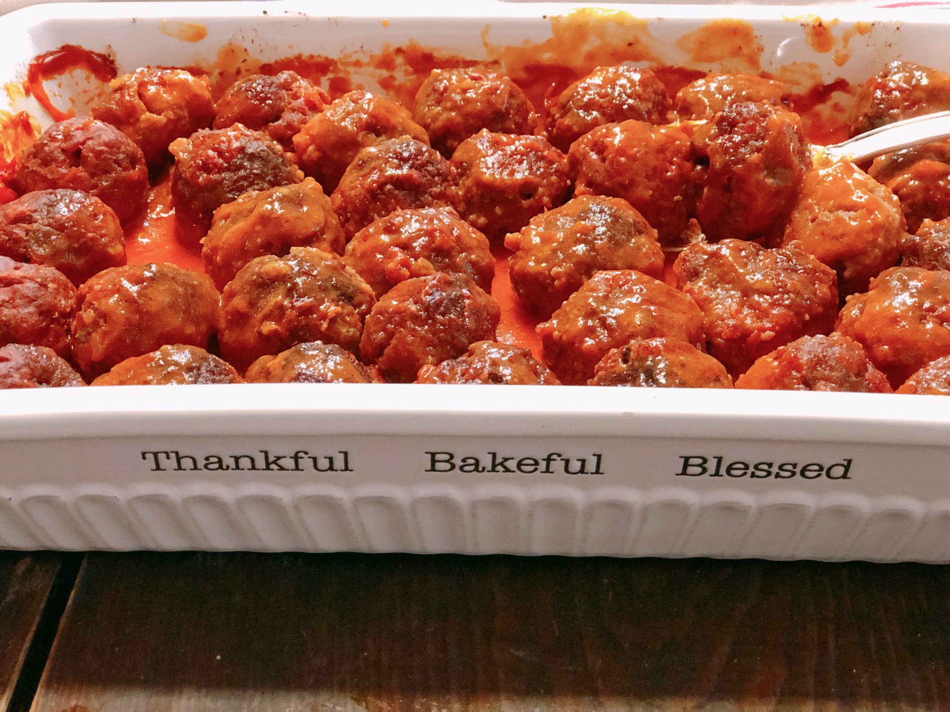 Old Fashioned Farmhouse Iowa Ham Balls from Farmwife Feeds are a classic meatball style dish made with hamburger and ground ham in a tomato base sauce. #hamballs #meatballs #pork #beef #recipe