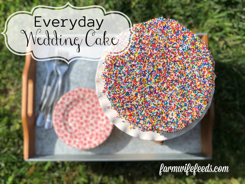 Everyday Wedding Cake from Farmwife Feeds is an easy homemade add to box mix cake that tastes bakery made. #weddingcake #cake #sprinkles #boxmix