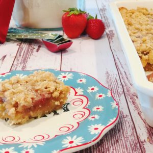 Grandma's Rhubarb Bars from Farmwife Feeds with a touch of strawberry jam is a great dessert for pitch-ins and get togethers. #rhubarb #recipe #bardessert