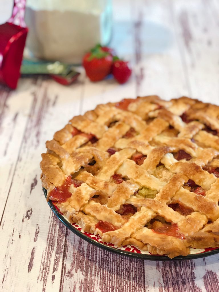 Strawberry Rhubarb Pie from Farmwife Feeds is a family recipe that is a county fair pie winner! #recipe #pie #rhubarb #strawberry