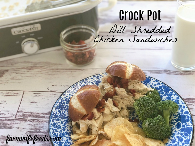 Crock Pot Dill Shredded Chicken Sandwiches from Farmwife Feeds is a simple dinner ready when you get home! #dill #sandwich #chicken #easyrecipe #crockpot