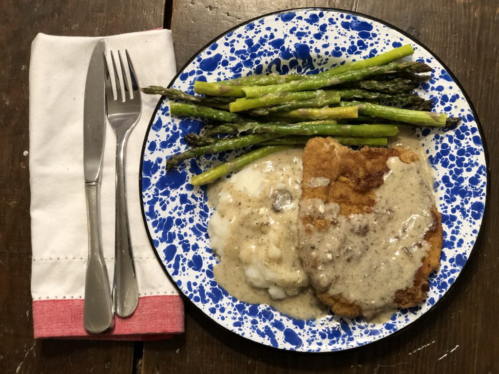 Pork Schnitzel with Dill Sauce is a great way to take pork tenderloins to the next level with an easy recipe. #pork #castiron #schnitzel