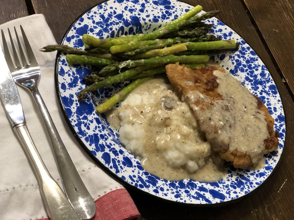 Pork Schnitzel with Dill Sauce is a great way to take pork tenderloins to the next level with an easy recipe. #pork #castiron #schnitzel