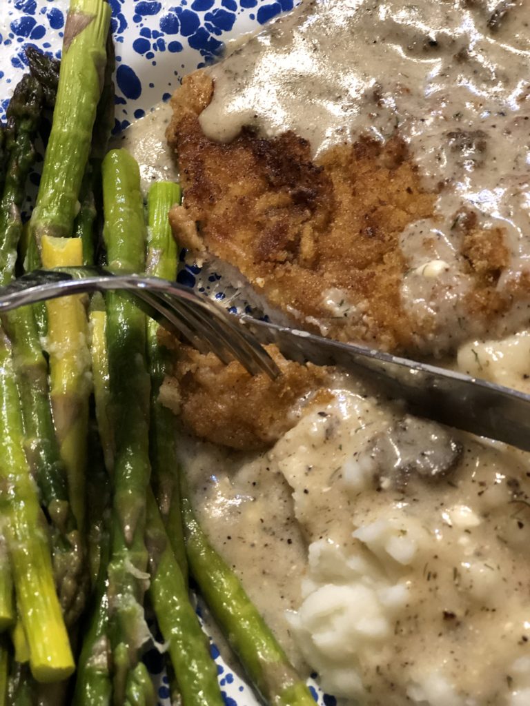 Pork Schnitzel with Dill Sauce is a great way to take pork tenderloins to the next level with an easy recipe. #pork #castiron #schnitzel