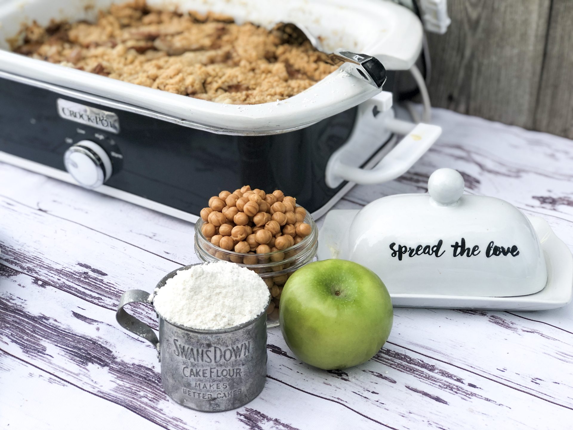 Crock Pot Apple Cobble from Farmwife Feeds is an easy dessert with fresh apple that's easy to toss in the slow cooker for a great dessert. #apples #recipe #dessert #cobbler