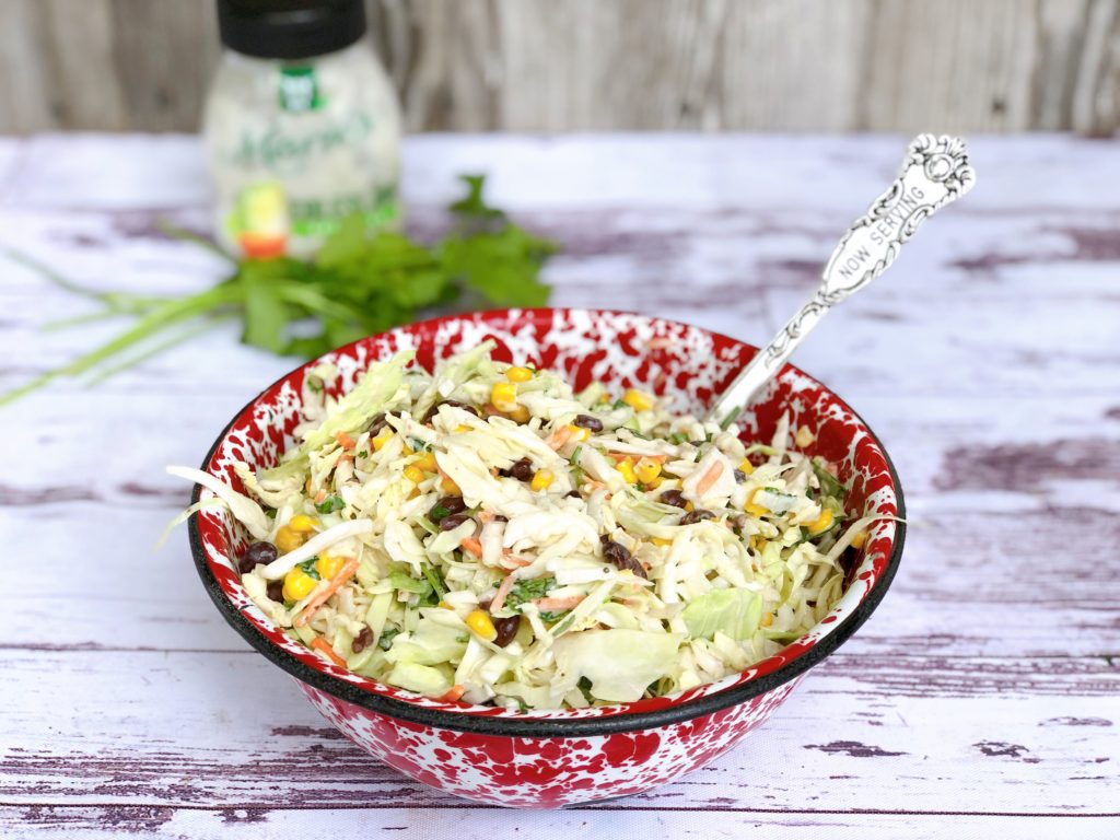 Cilantro Cole Slaw from Farmwife Feeds, a fresh easy twist on traditional slaw that's easy to throw together. #recipe #slaw #cilantro