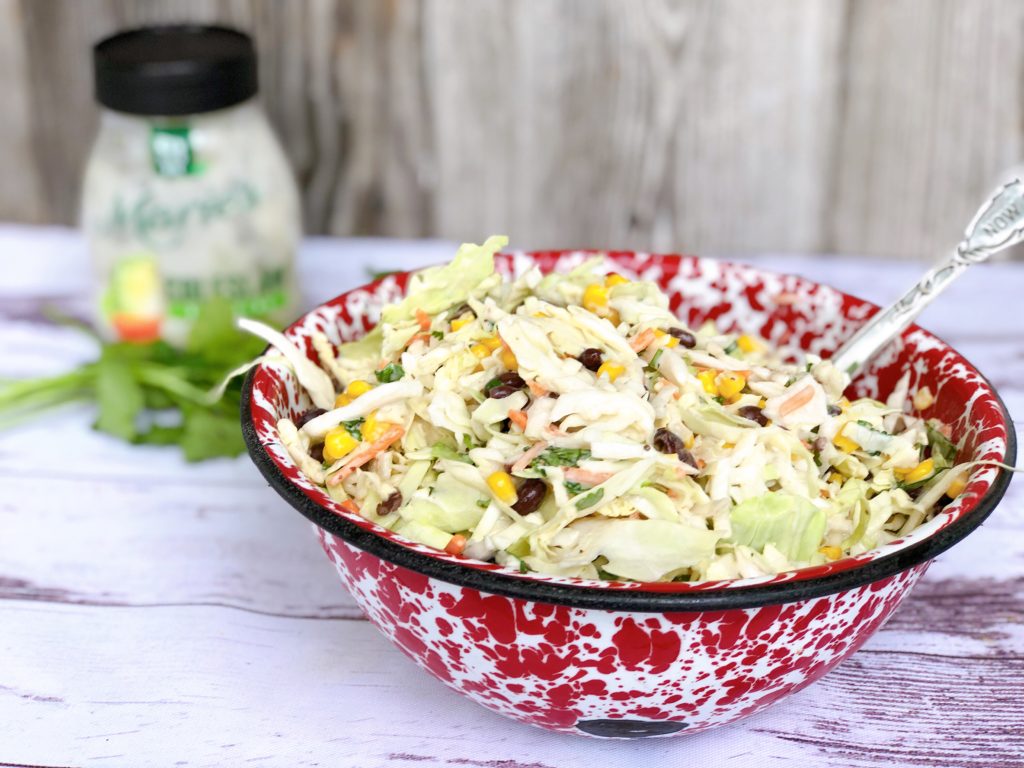 Cilantro Cole Slaw from Farmwife Feeds, a fresh easy twist on traditional slaw that's easy to throw together. #recipe #slaw #cilantro