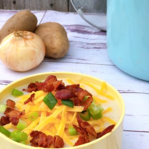 Mom's Creamy Potato Soup from Farmwife Feeds is just a few simple wholesome ingredients that you can then load up with toppings to your liking. #soup #potatoes #potato #recipe