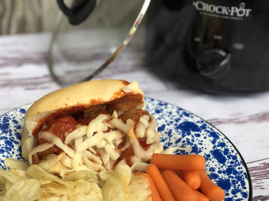 Super Easy Crock Pot Meatballs from Farmwife Feeds are a great easy meal or great tailgating option. #meatballs #crockpot #slowcooker #tailgate