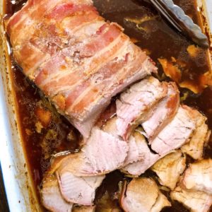 Bacon Wrapped Marinated Pork Tenderloin from Farmwife Feeds is an incredible blend of flavors that everyone will love. #pork #bacon #marinated