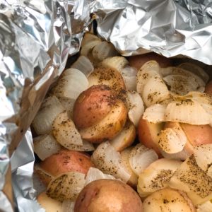 Foil Packet Potatoes and Onions from Farmwife Feeds is simple, easy side dish for any night of the week! #potatoes #onions #recipe #grill