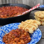 Over The Top Double BBQ Baked Beans from Farmwife Feeds is a great meal or pitch-in potluck favorite everyone will love! #beans #bakedbeans