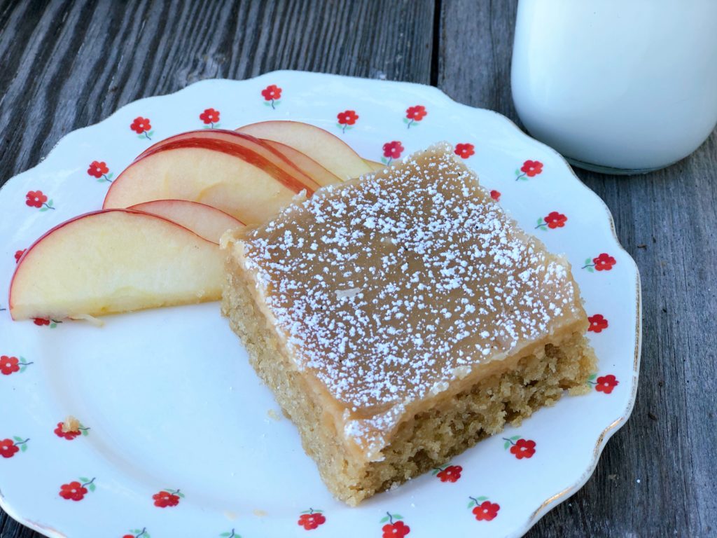 Peanut Butter Sheet Cake from Farmwife Feeds is a homemade cake and icing that will feed a crowd. #peanutbutter #cake #homemade