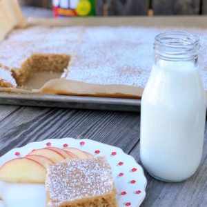 Peanut Butter Sheet Cake from Farmwife Feeds is a homemade cake and icing that will feed a crowd. #peanutbutter #cake #homemade