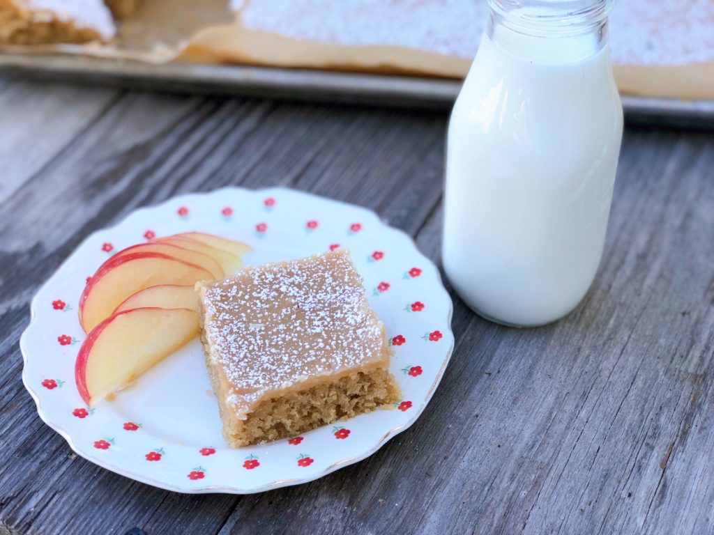 Peanut Butter Sheet Cake from Farmwife Feeds is a homemade cake and icing that will feed a crowd. #peanutbutter #cake #homemade