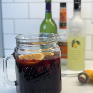 Semi-Sweet Red Wine Sangria from Farmwife Feeds, fruity wine with Triple Sec and Lemoncello made by the pitcher! #sangria #redwine #drinks