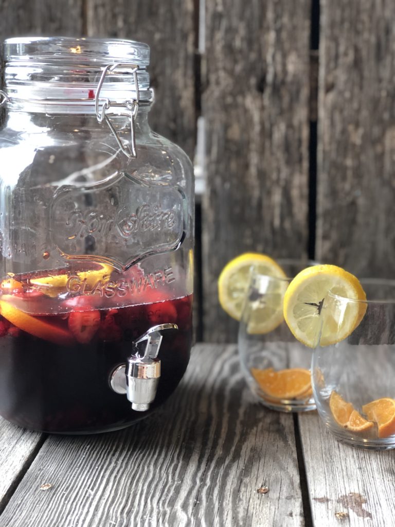 Super Simple Sangria from Farmwife Feeds is the easiest cocktail for a crowd or to enjoy by yourself watching the world go by. #sangria #redwine #fruit #wine